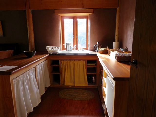straw bale cabin kitchen