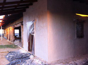 plastering straw bale house